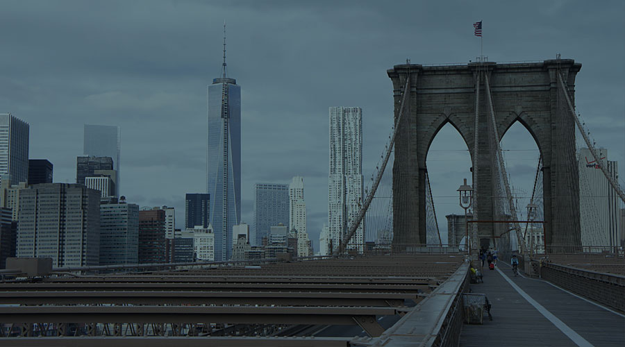 A view of a downtown city atop a bridge