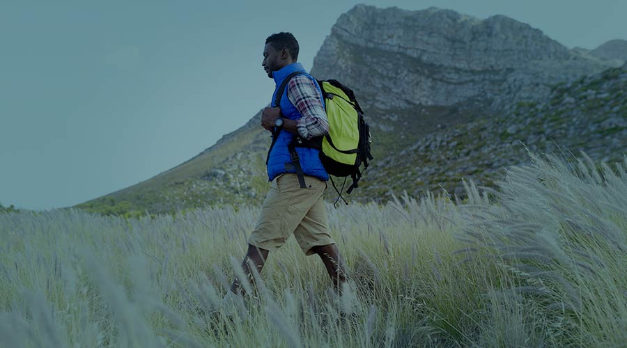 A backpacker strolling through the hillside