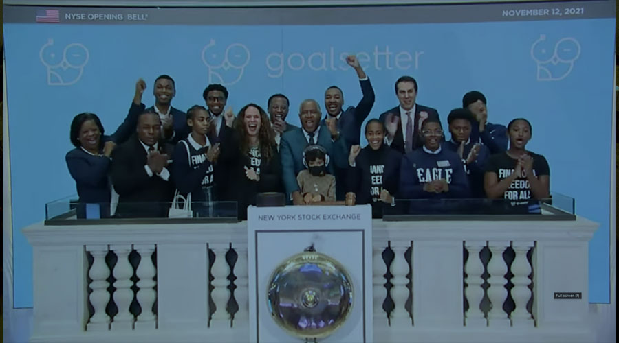 A screenshot of Vista’s Robert F. Smith with Goalsetter’s Tanya Van Court and Eagle Academy Students ringing the opening bell of the NYSE