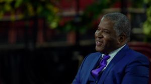 An image of Robert F. Smith of Vista speaking to business leaders