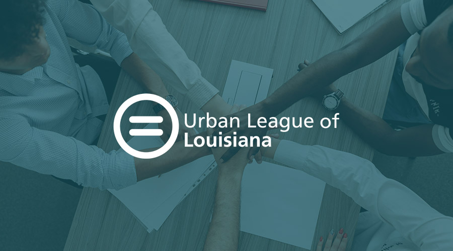 Group of people putting their hands on top of each other's hands with an overlay of Urban League of Louisiana logo.