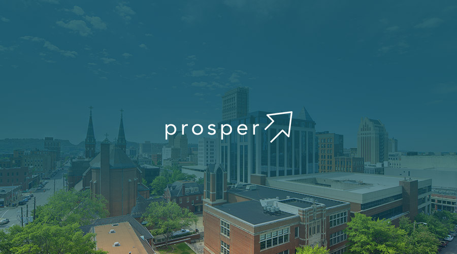 An image of downtown Birmingham, Alabama's skyline with an overlay of blue with Prosper text in the middle.