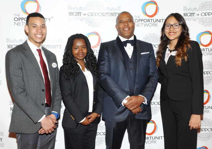 Robert F. Smith stands with colleagues from The Opportunity Network for "A Night of Opportunity"