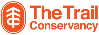 The official logo of The Trail Convercancy