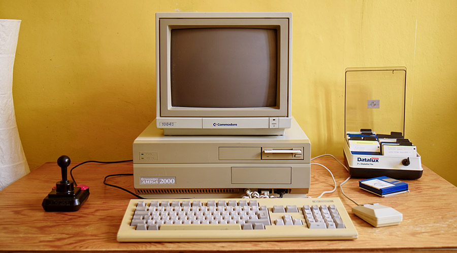 A desktop computer from the 1990s on a desk.